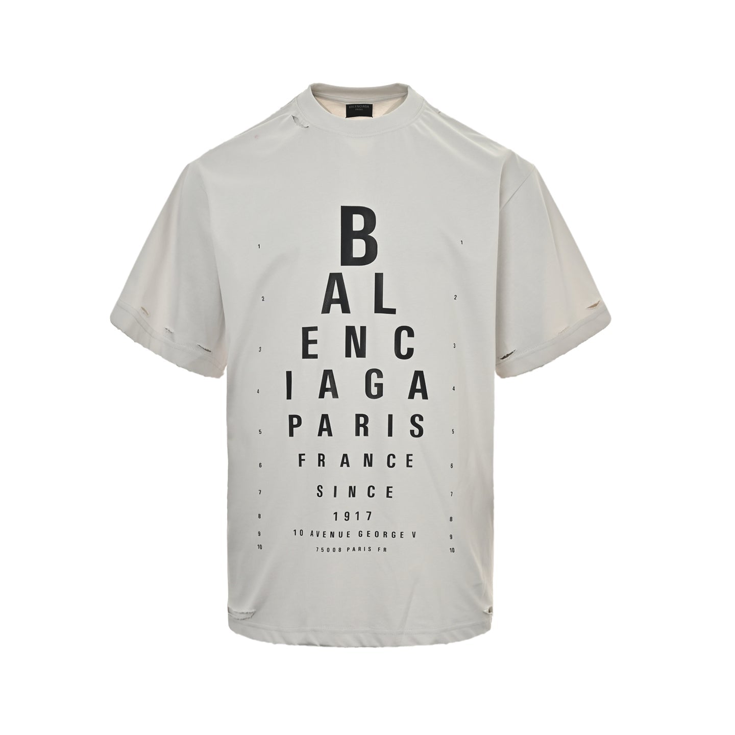 Eye chart knife cuts holes in short sleeves