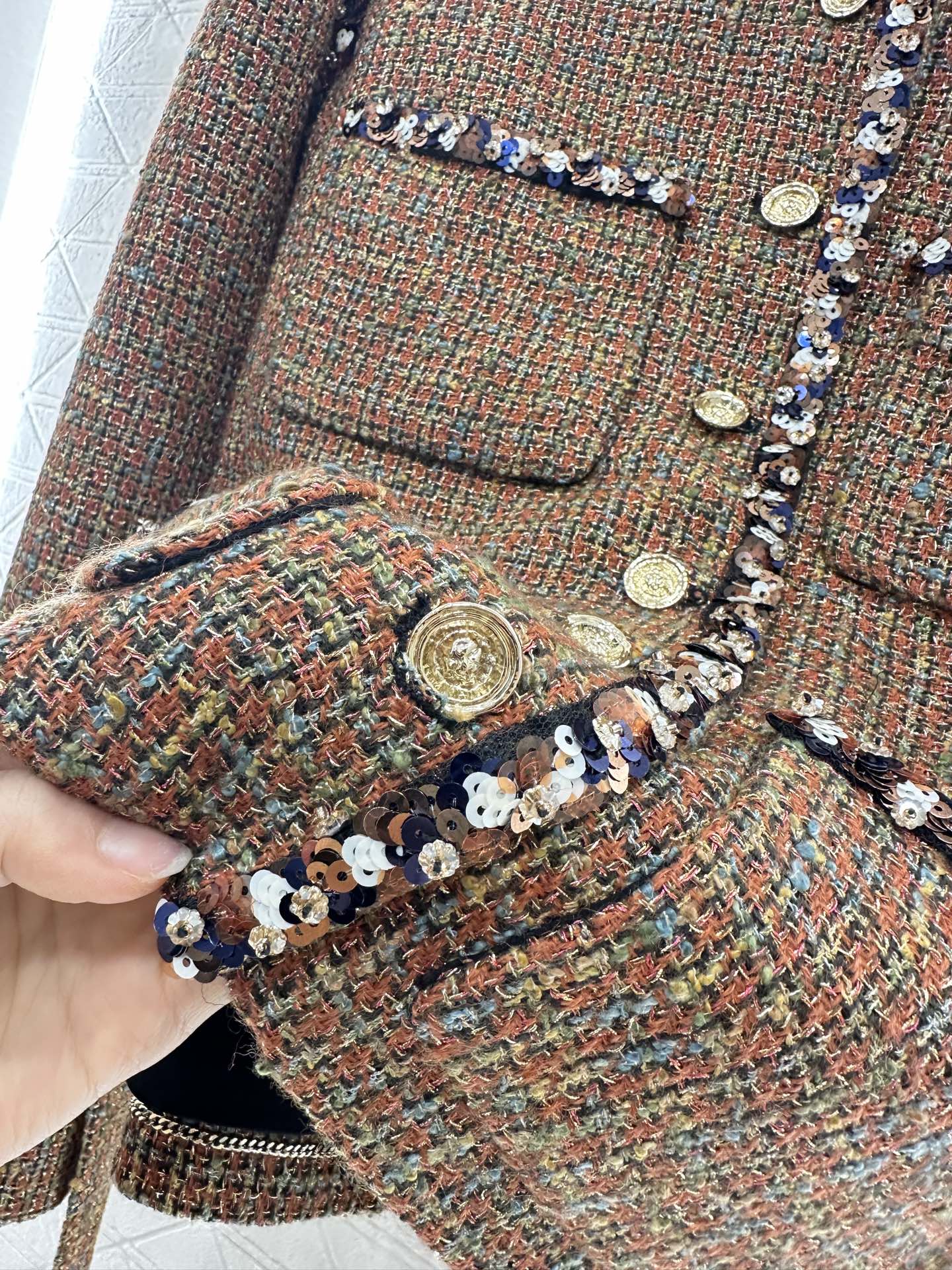 Lapel and belted dress jacket with beaded hem