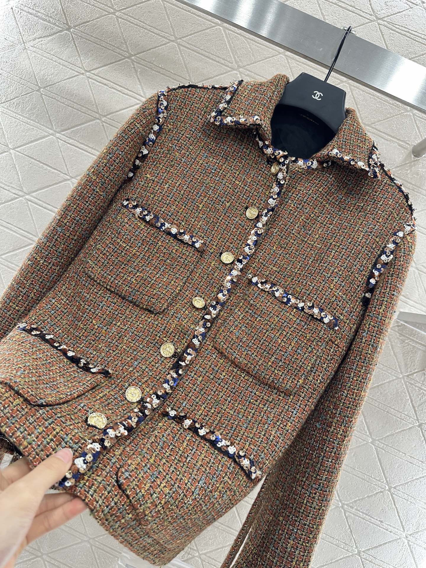 Lapel and belted dress jacket with beaded hem