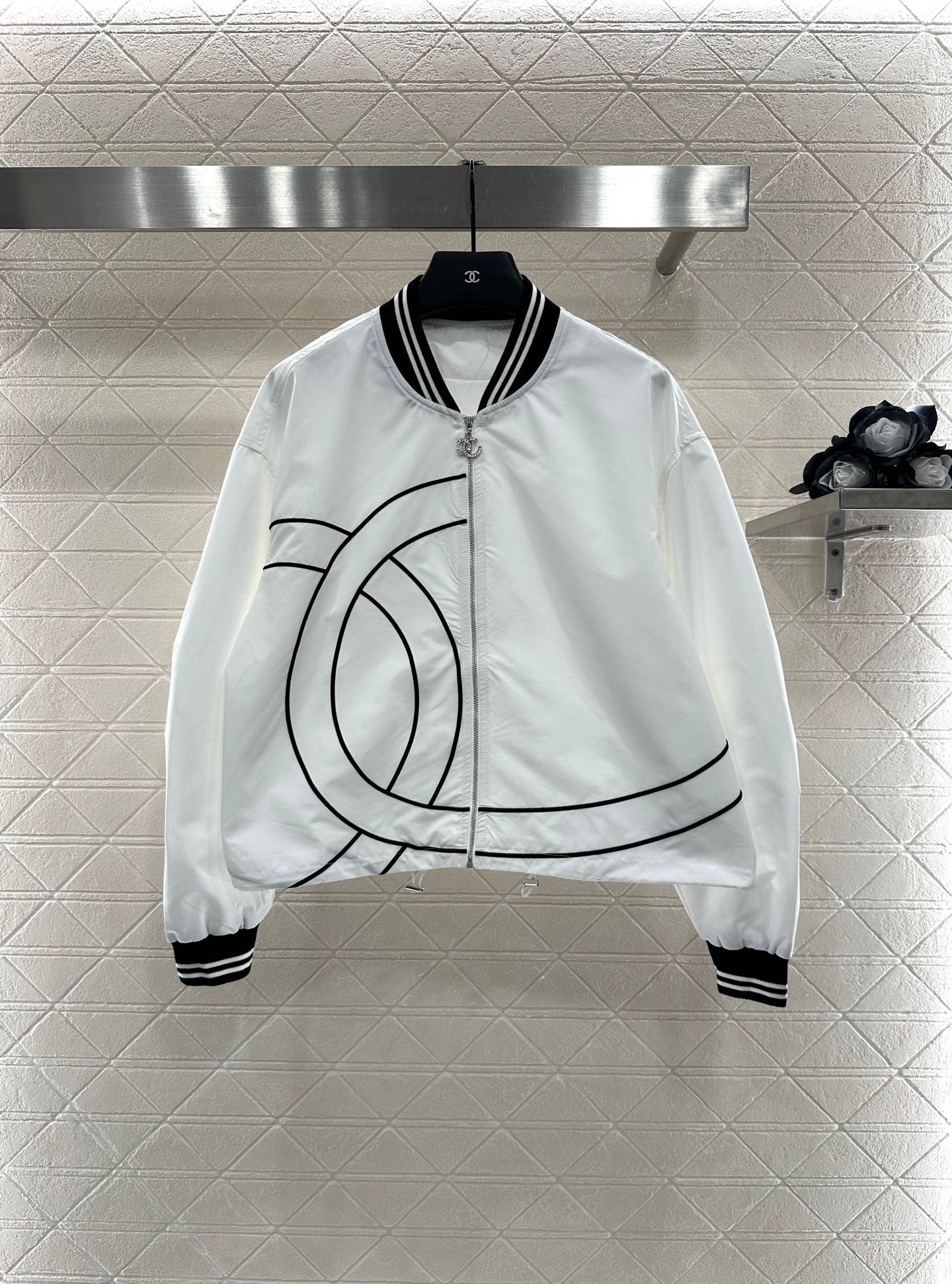 Casual baseball jacket and trousers set.