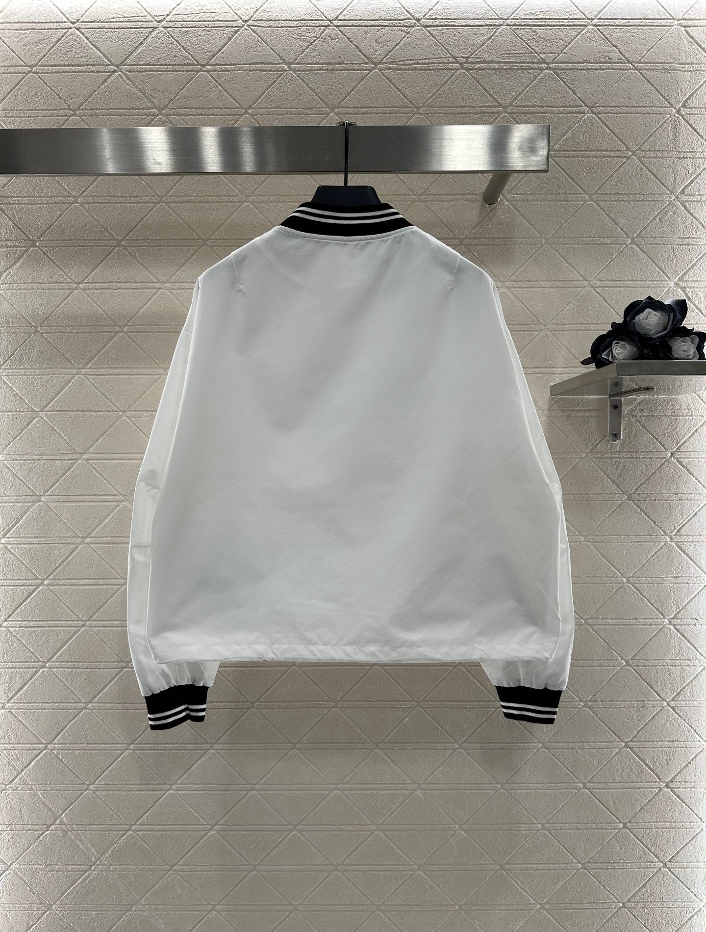 Casual baseball jacket and trousers set.