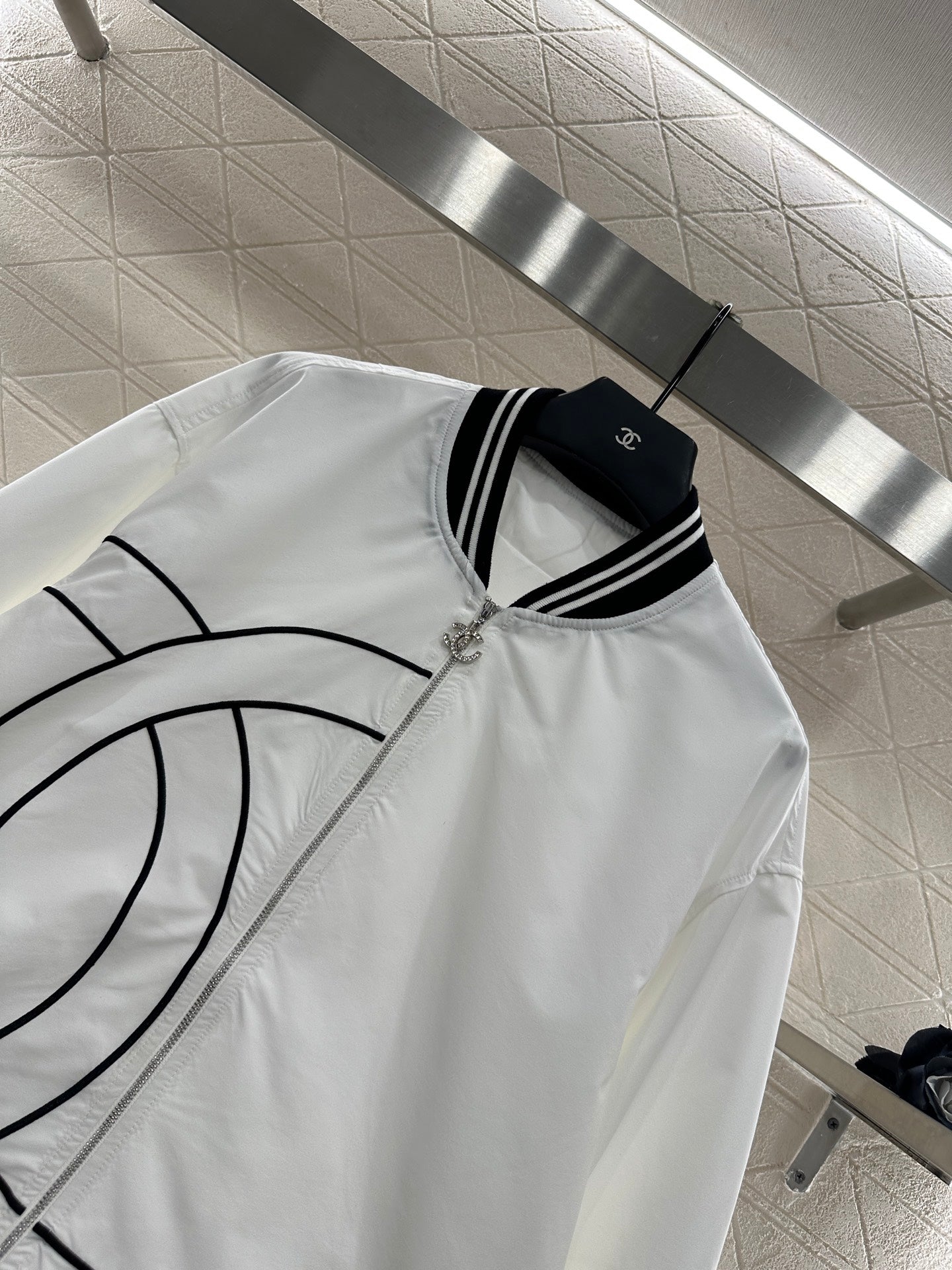 Casual baseball jacket and trousers set.