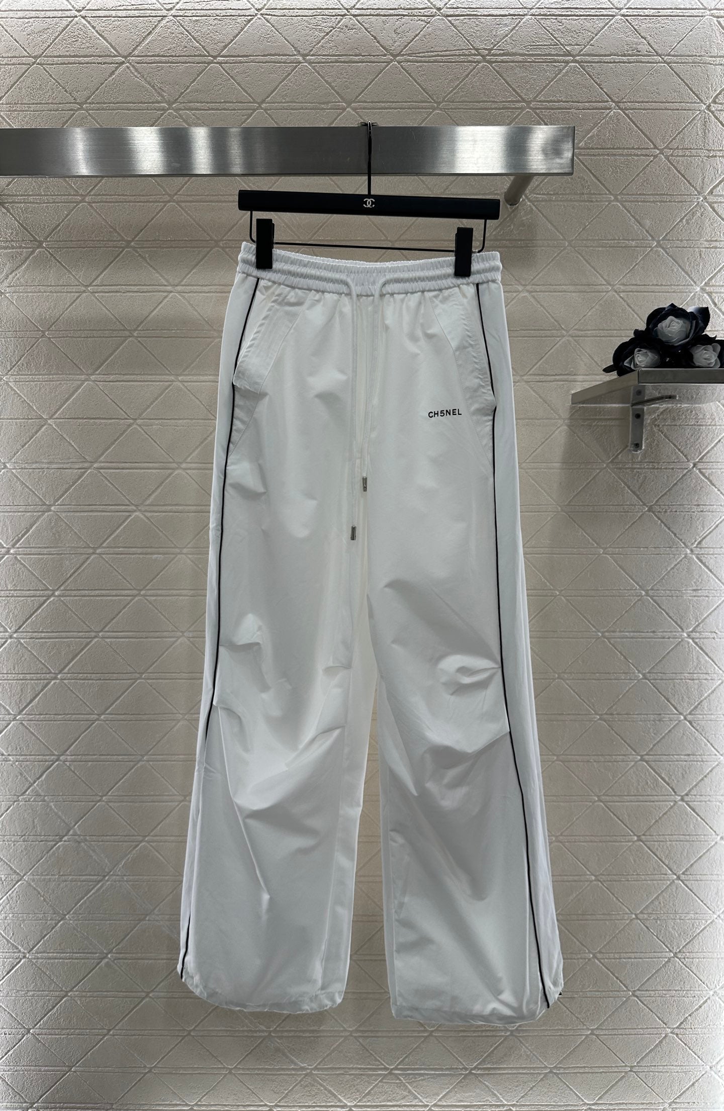 Casual baseball jacket and trousers set.