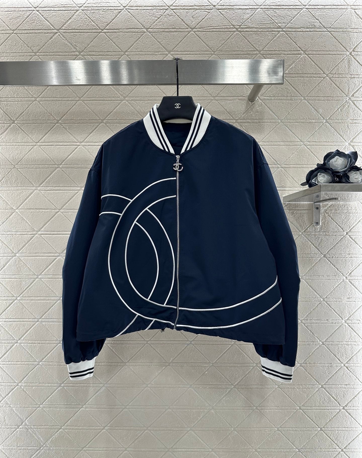 Casual baseball jacket and trousers set.