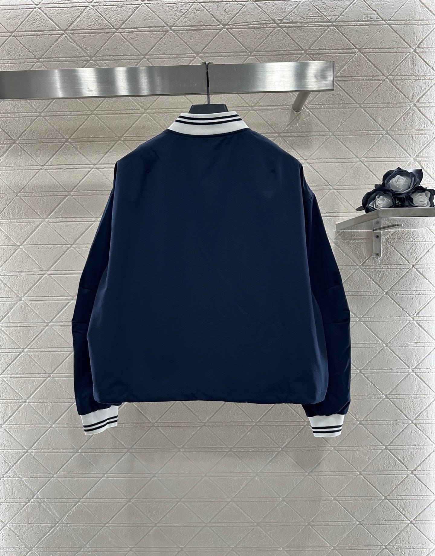 Casual baseball jacket and trousers set.
