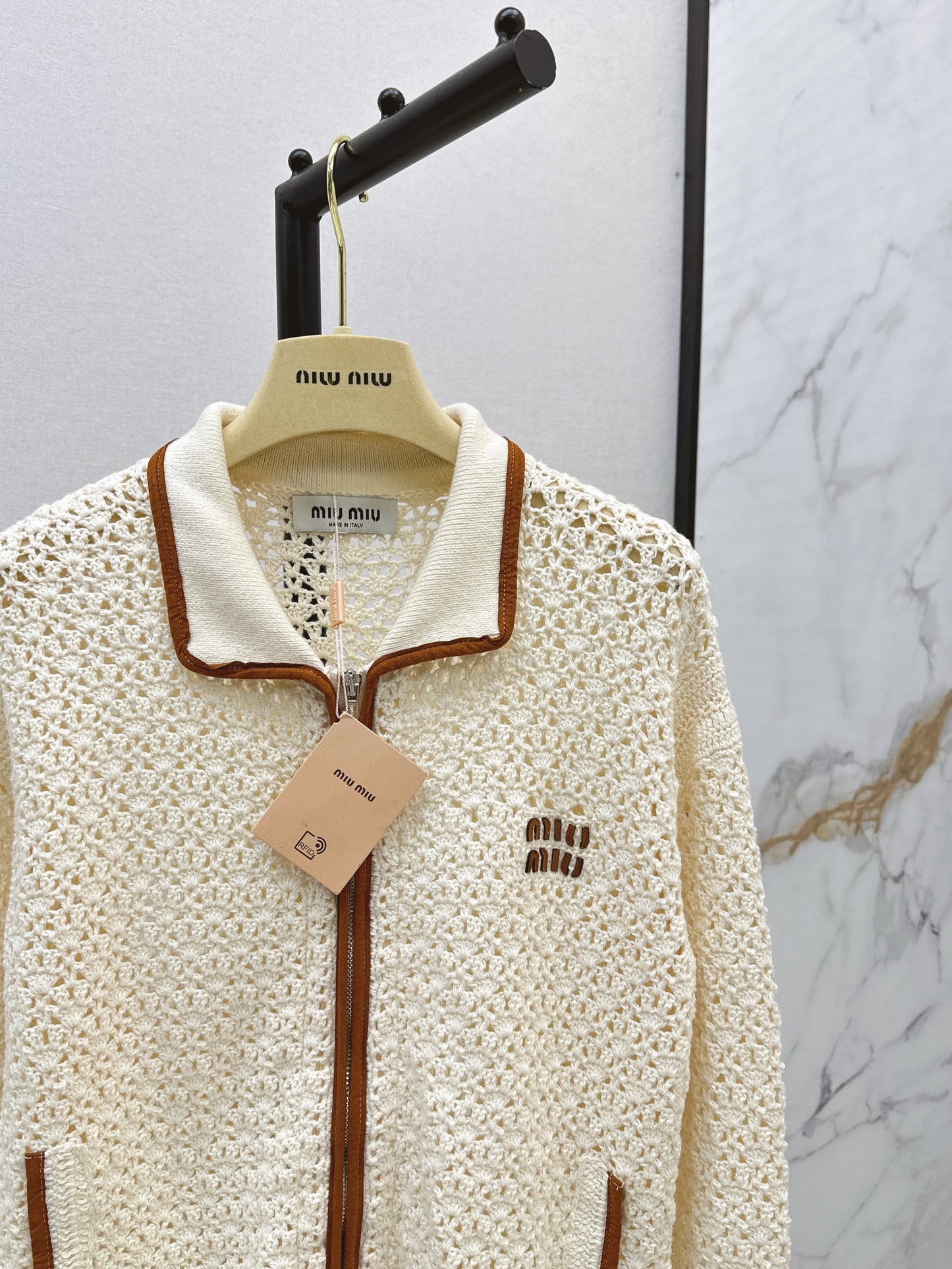 Hand-crocheted jacket with vintage suede patchwork