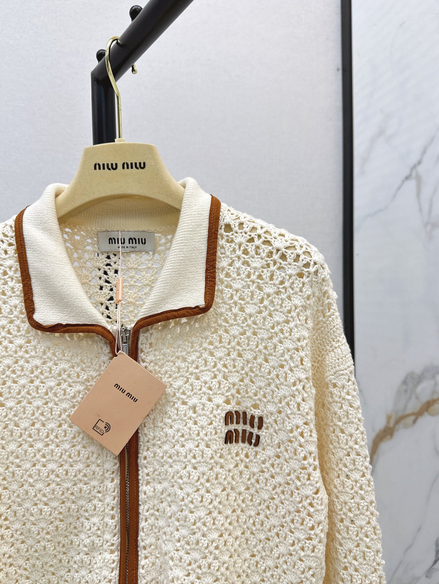 Hand-crocheted jacket with vintage suede patchwork