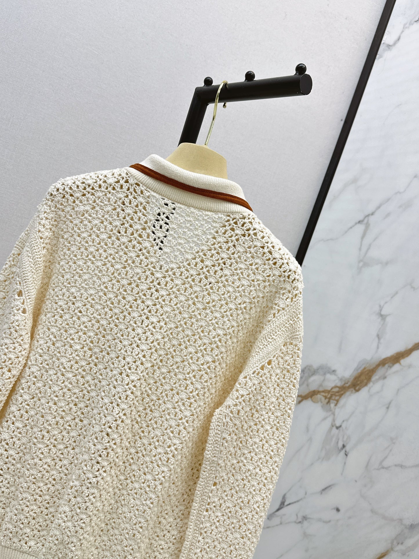 Hand-crocheted jacket with vintage suede patchwork