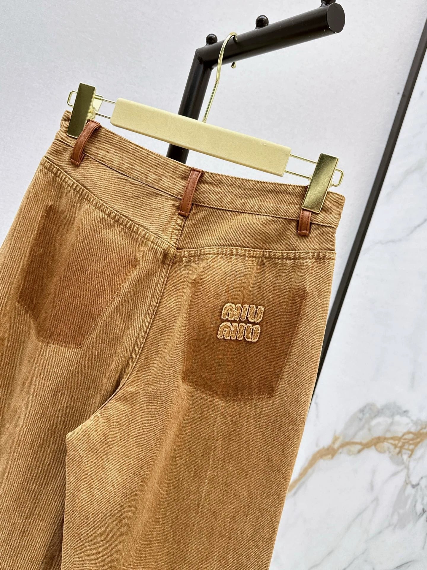 25Brown leather trim slim pants