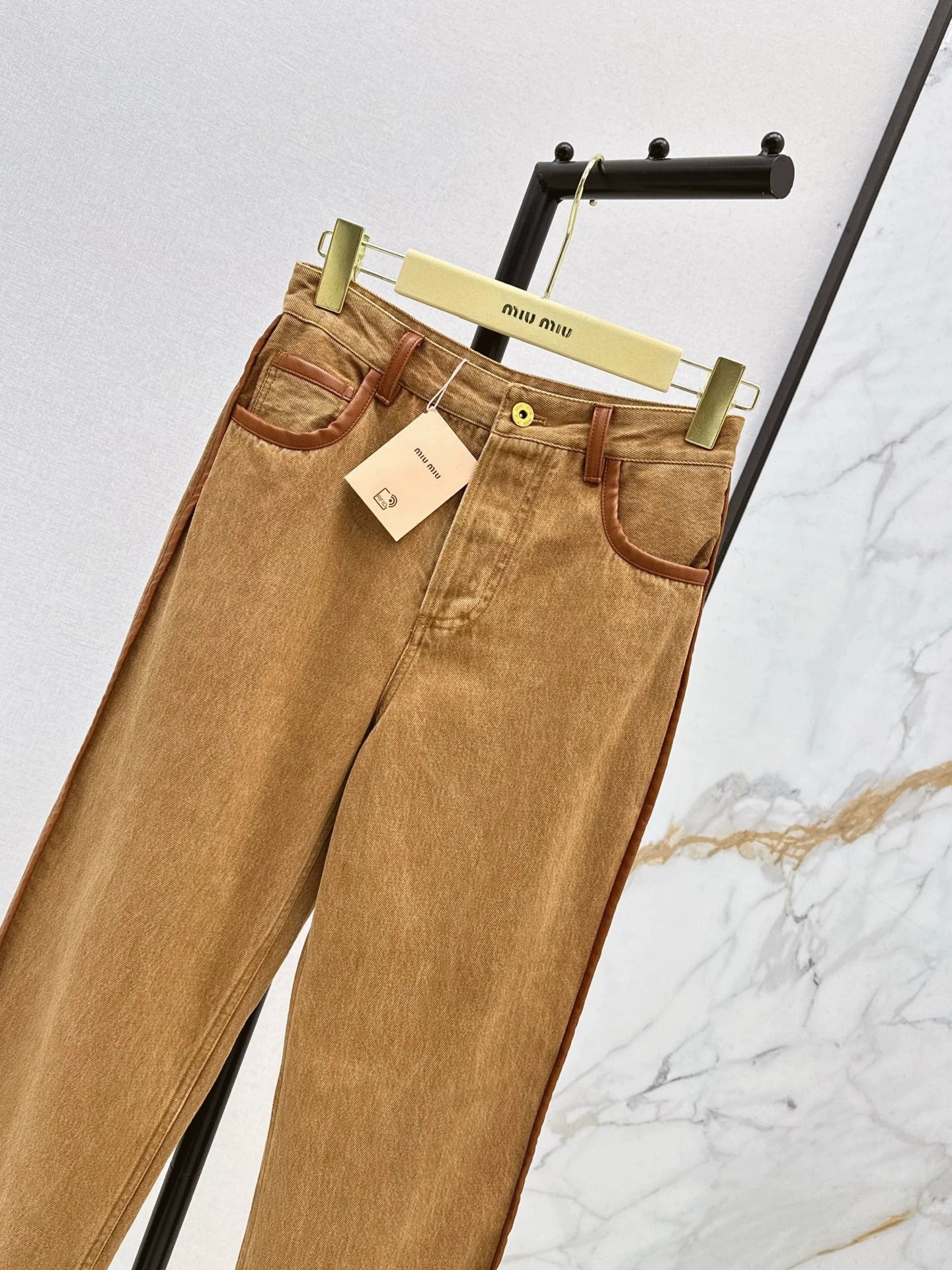 25Brown leather trim slim pants