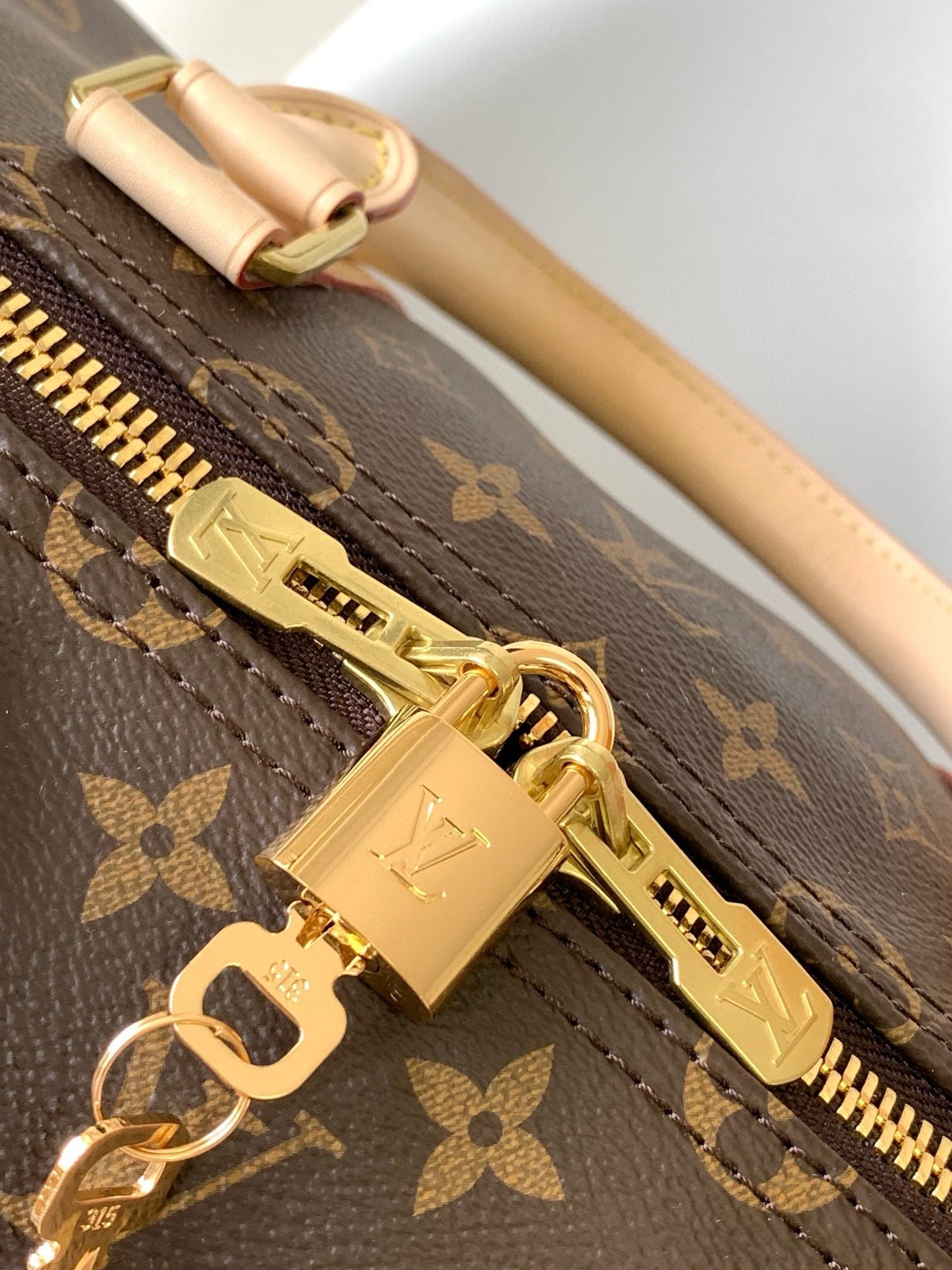 Keepall Bandouliere 55 Monogram Canvas Brown Gold Hardware