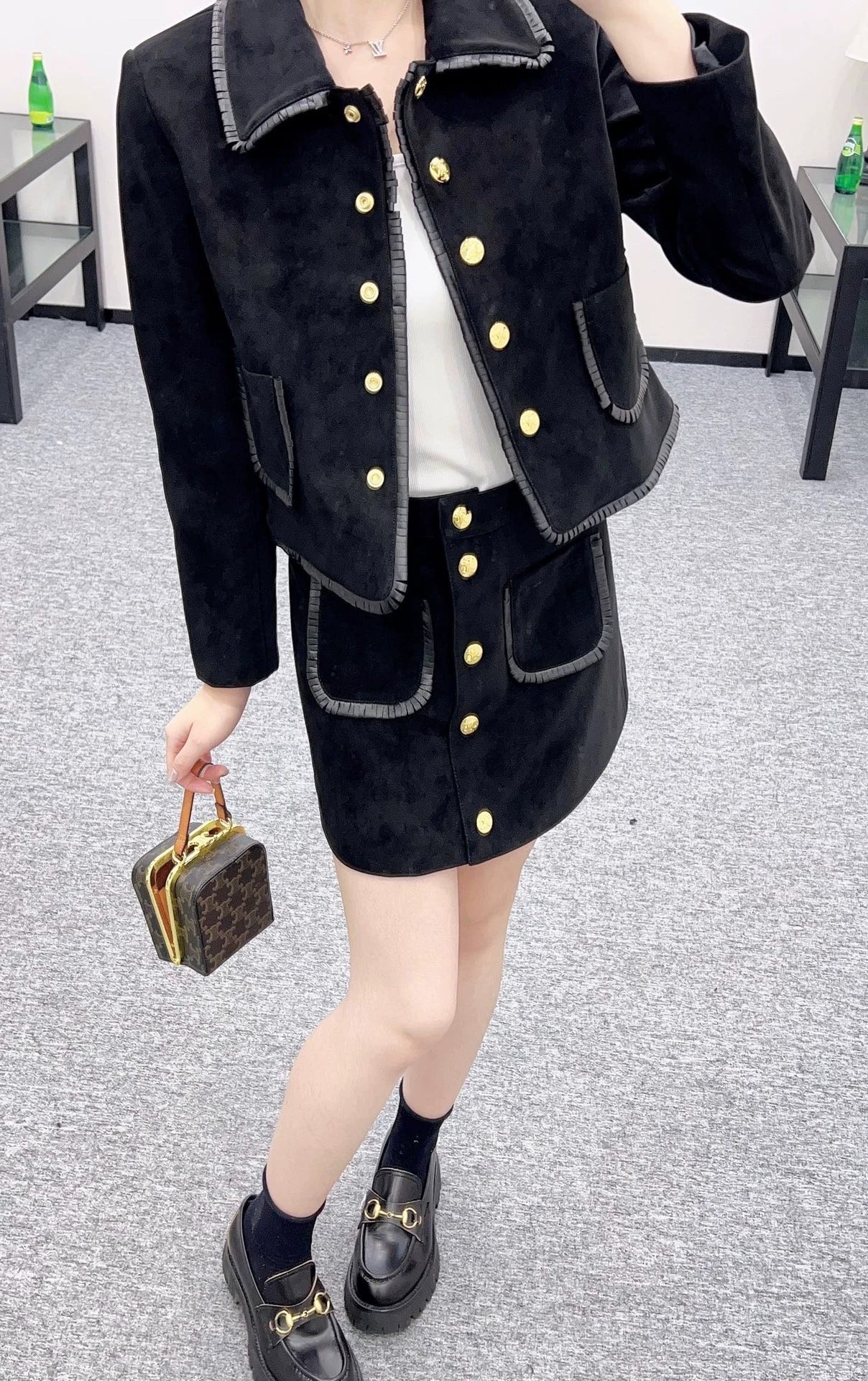 25 Genuine leather jacket and skirt set.