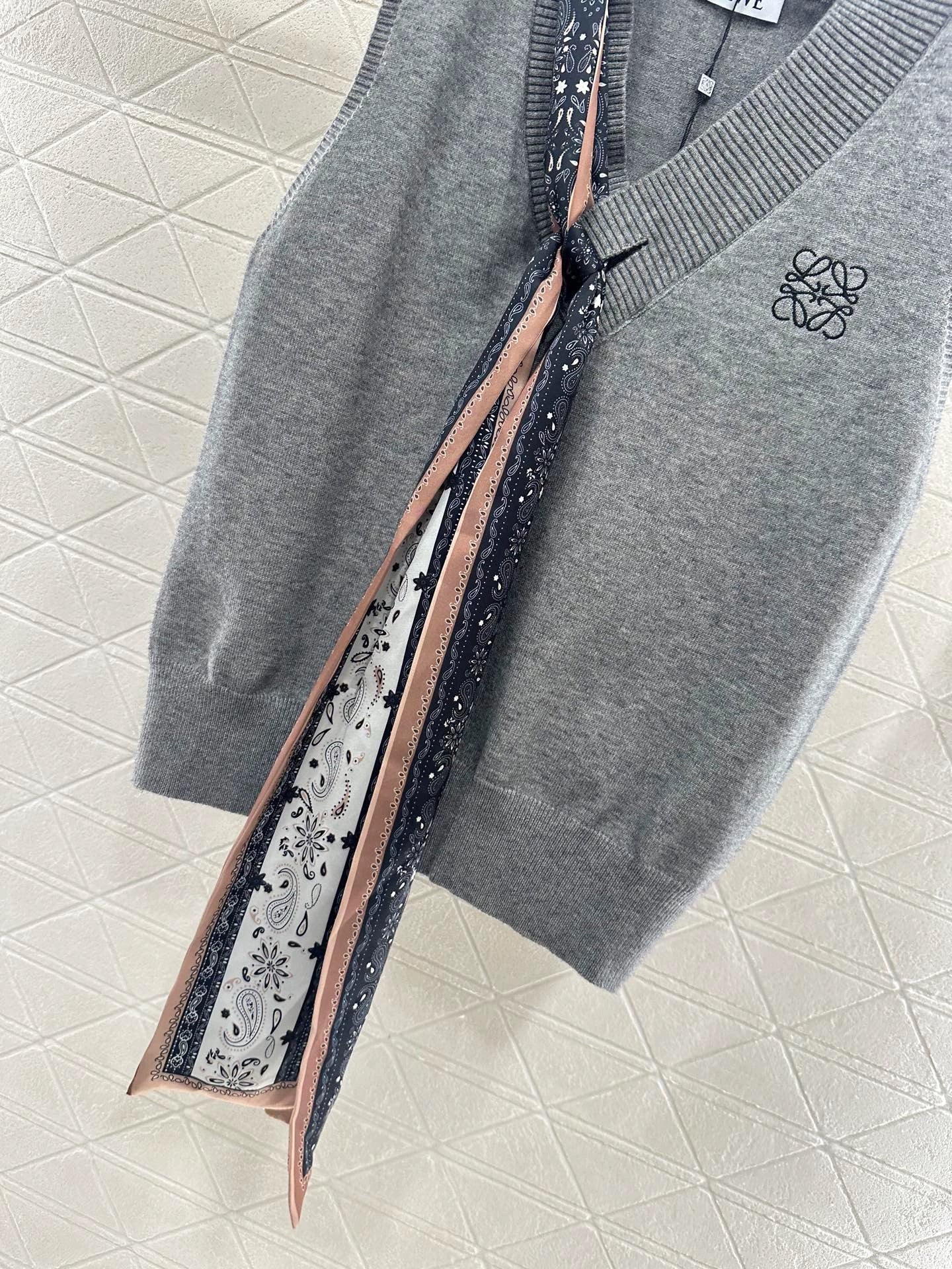25 Scarf Knit Vest