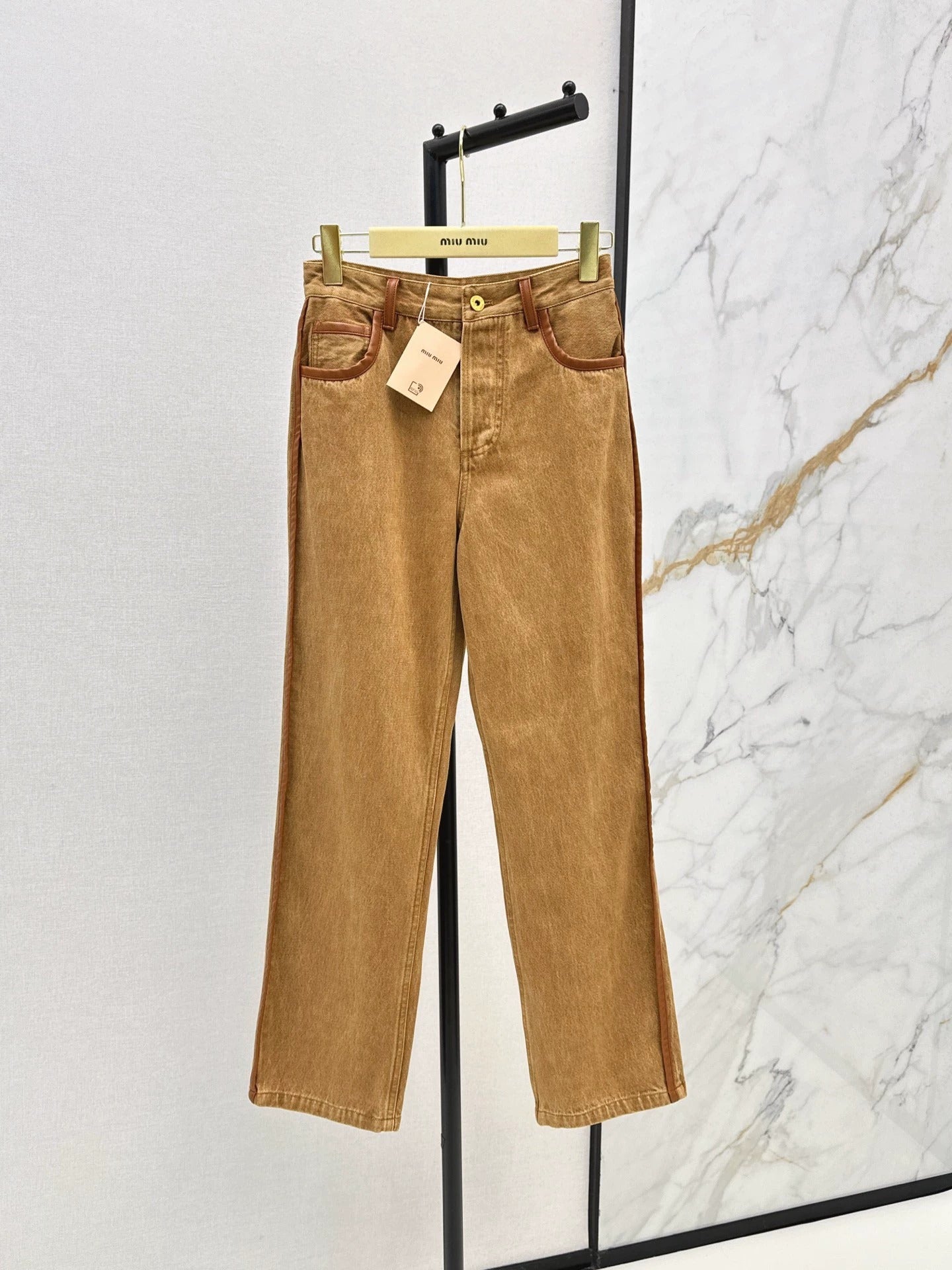 25Brown leather trim slim pants
