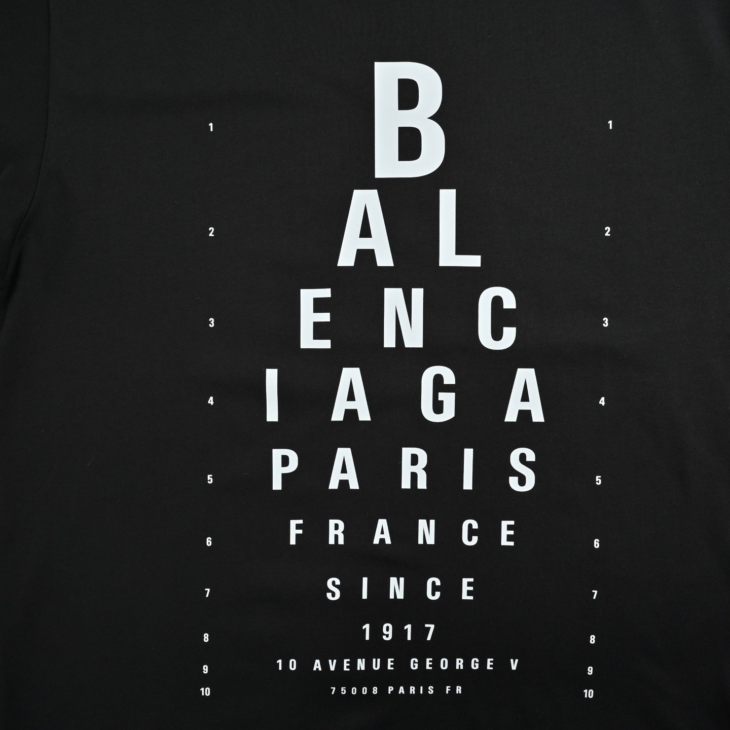 Eye chart knife cuts holes in short sleeves