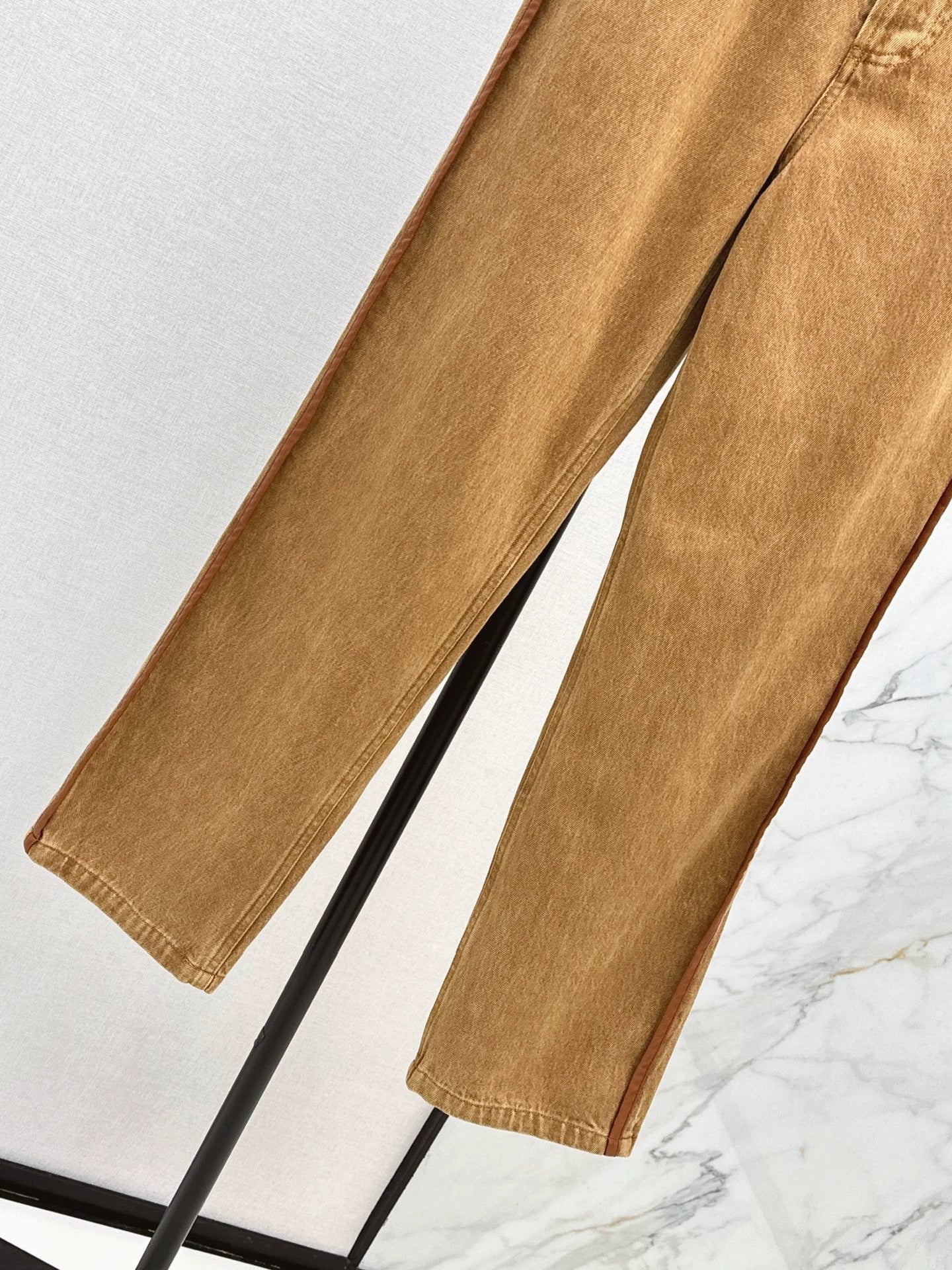25Brown leather trim slim pants