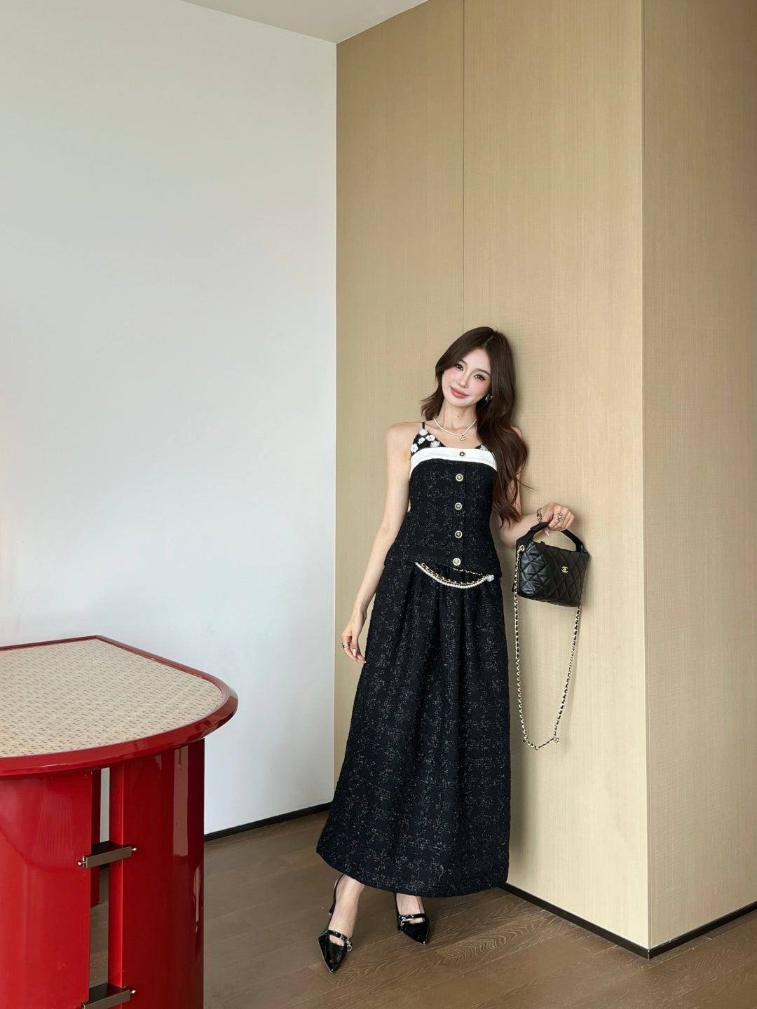 C 25 High-waisted pleated skirt with waist chain