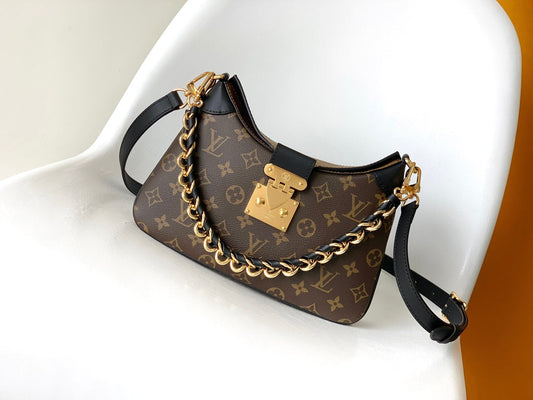 L 25 Classic old flower cowhide handbag
