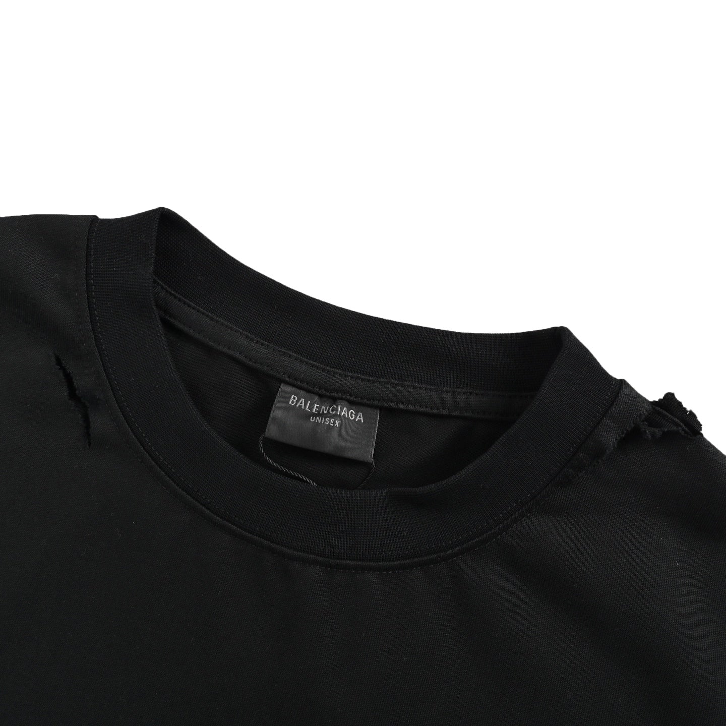 Eye chart knife cuts holes in short sleeves