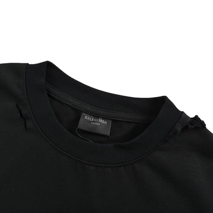 Eye chart knife cuts holes in short sleeves
