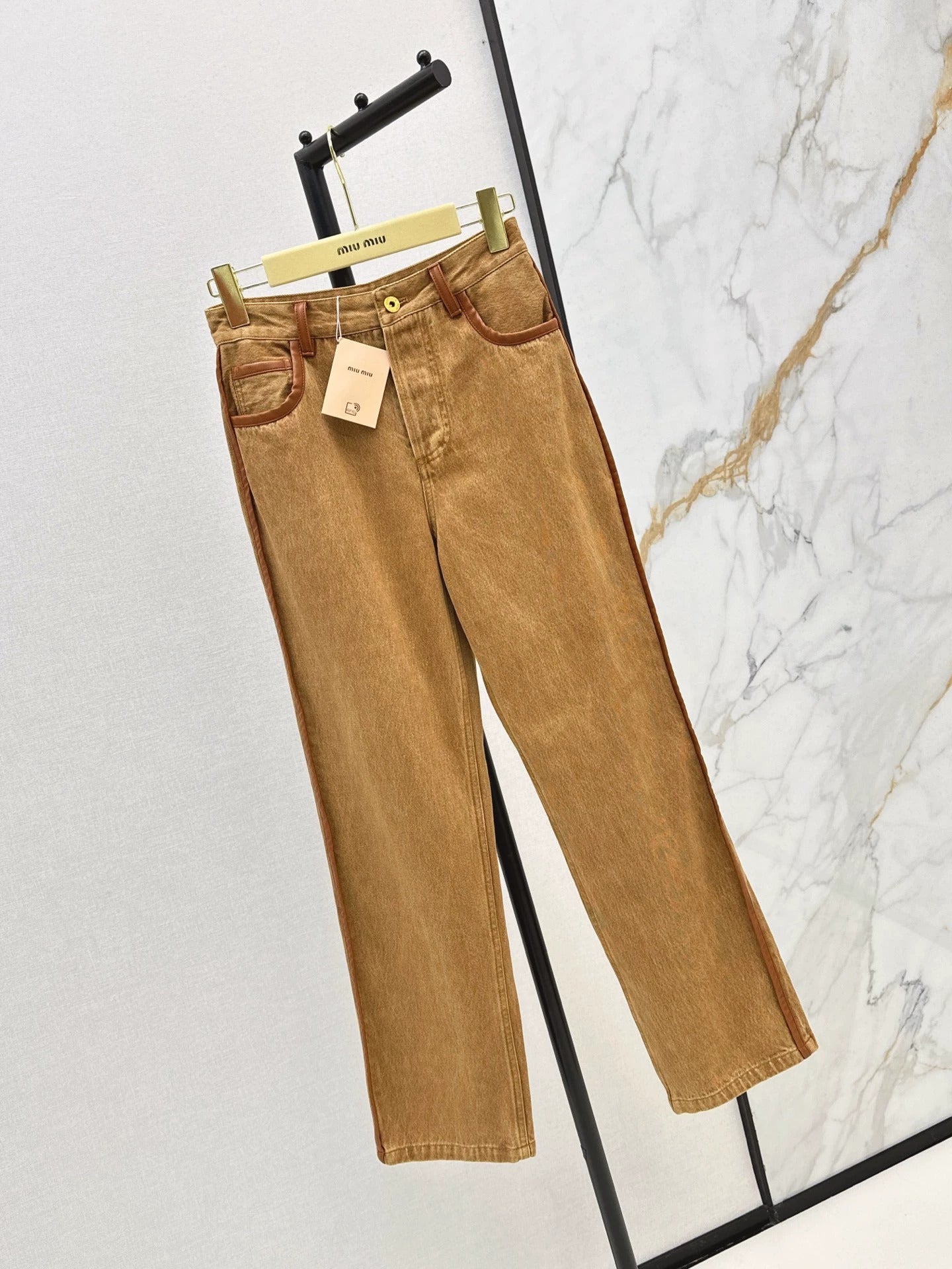 25Brown leather trim slim pants