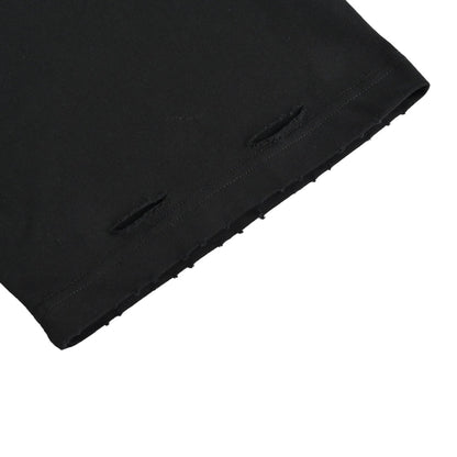 Eye chart knife cuts holes in short sleeves