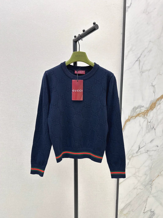 25 Knitted sweater with woven pattern round neck