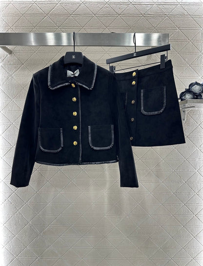 25 Genuine leather jacket and skirt set.
