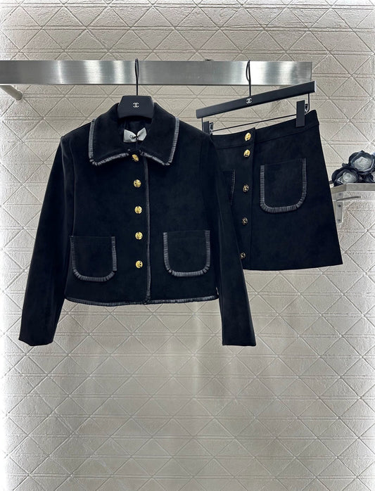 25 Genuine leather jacket and skirt set.