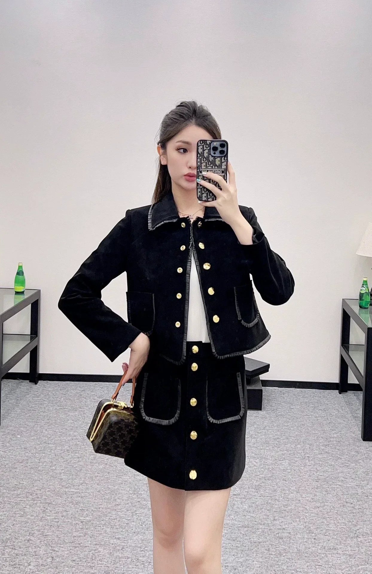 25 Genuine leather jacket and skirt set.
