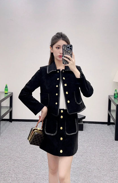 25 Genuine leather jacket and skirt set.