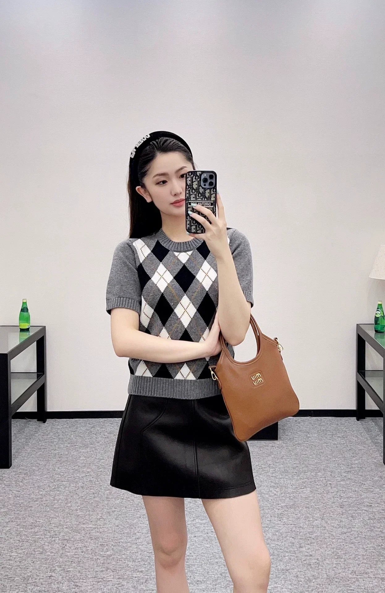 P 25 Diamond-patterned knit short-sleeved top