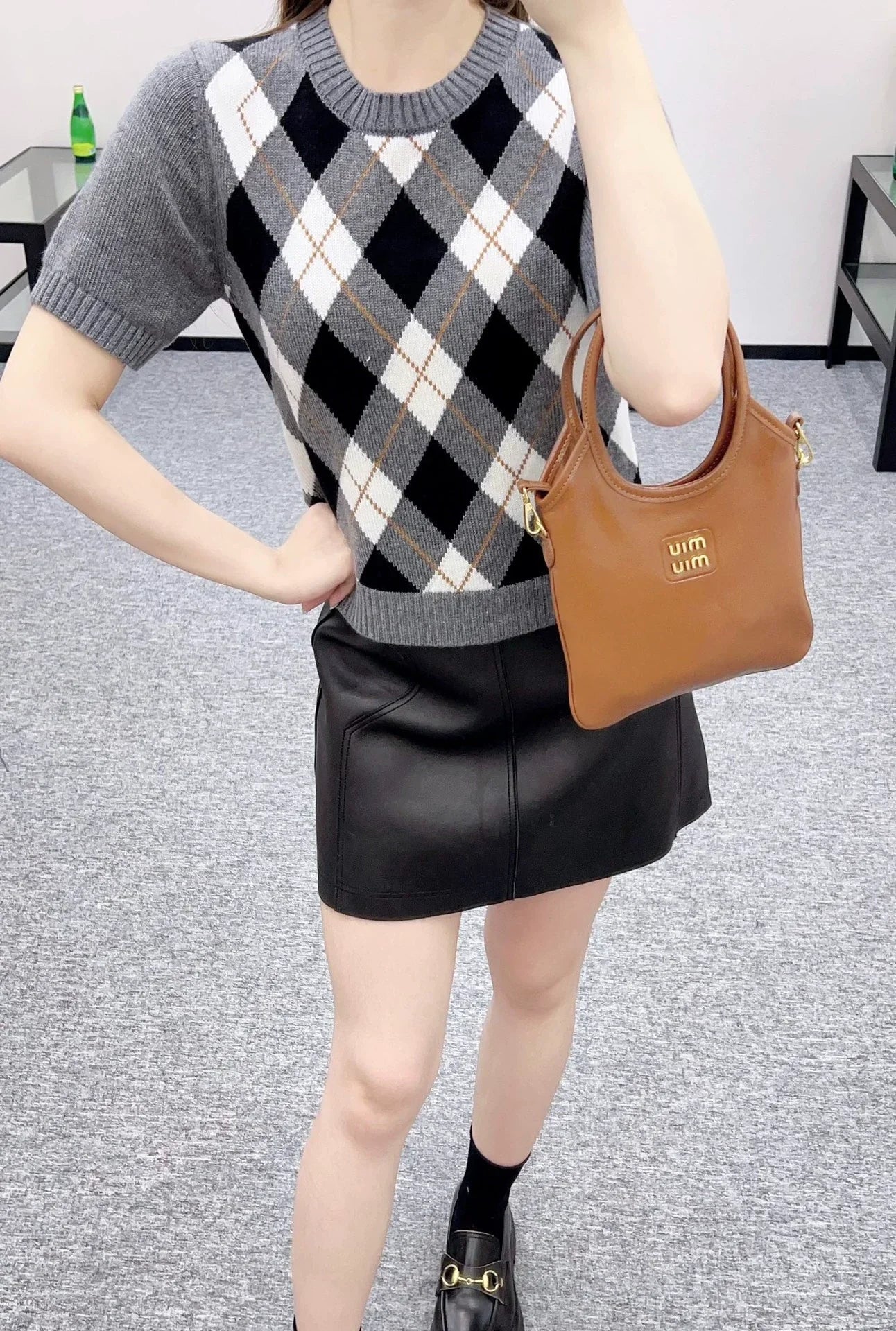 P 25 Diamond-patterned knit short-sleeved top