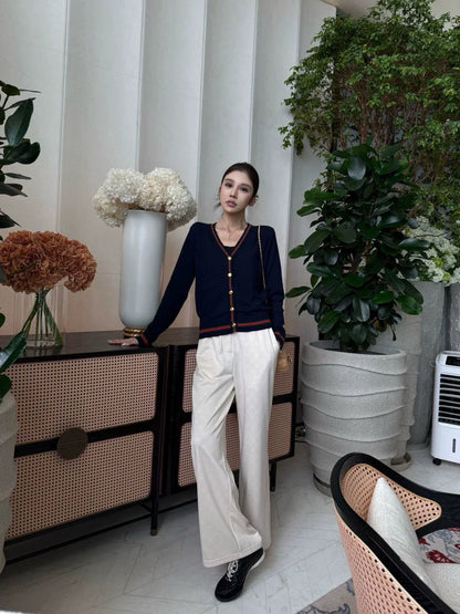 25 Knitted cardigan with woven pattern and V-neck