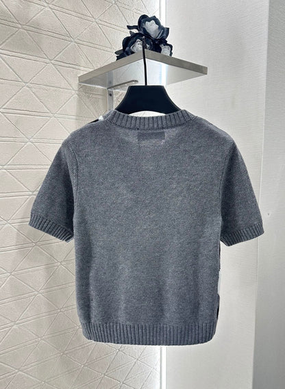 P 25 Diamond-patterned knit short-sleeved top