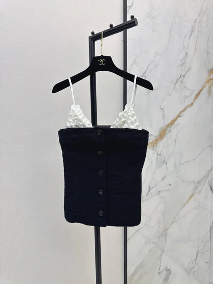 White floral top with black suspenders Vest