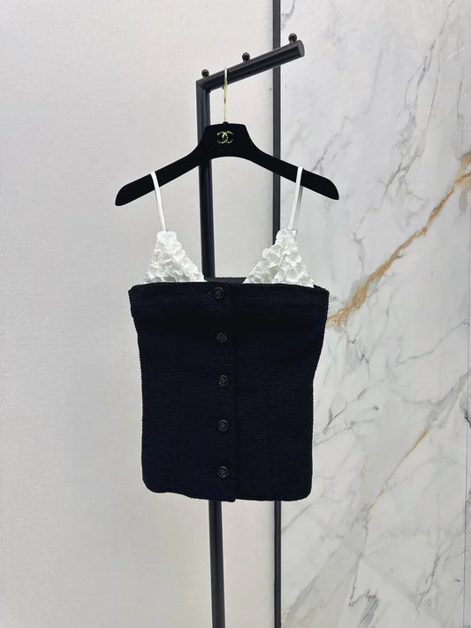 White floral top with black suspenders Vest
