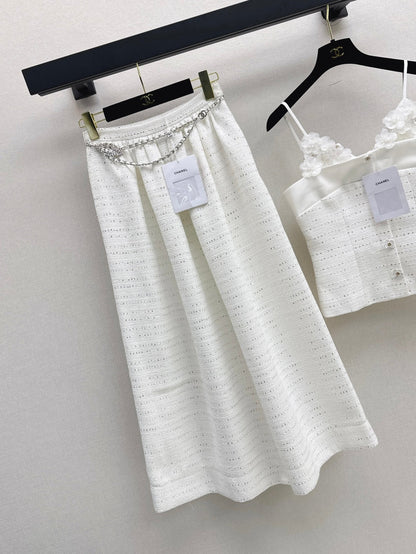 C 25 High-waisted pleated skirt with waist chain