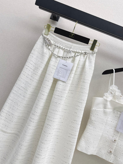 C 25 High-waisted pleated skirt with waist chain